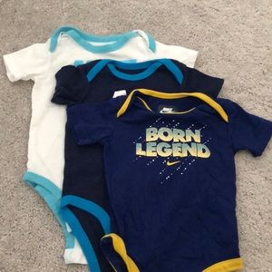 3 nike onesies